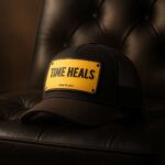 Time Heals - Unisex Trucker Cap